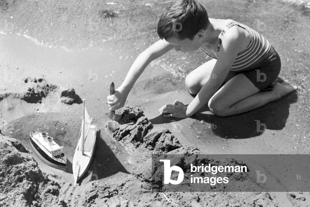 Little boy at lake Wannsee lido in Berlin, Germany 1930s (b/w photo)
