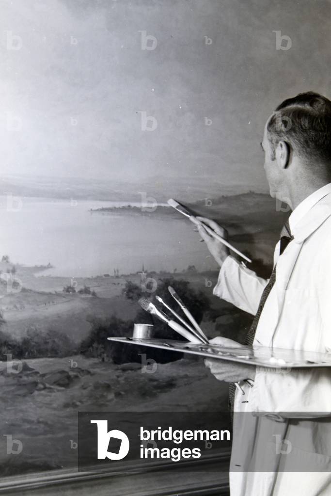 The artist, painter Hermann Gradl working, Painting on his landscape picture, painting, Germany 1930s (b/w photo)