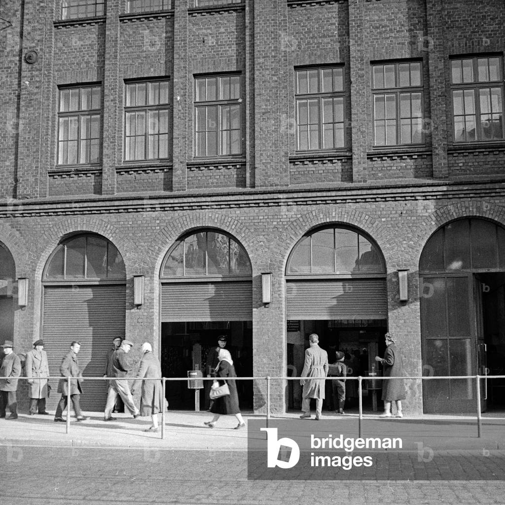 At the entrance of the Phoenix Gummiwerke rubber factory at Hamburg Harburg, Germany 1960s