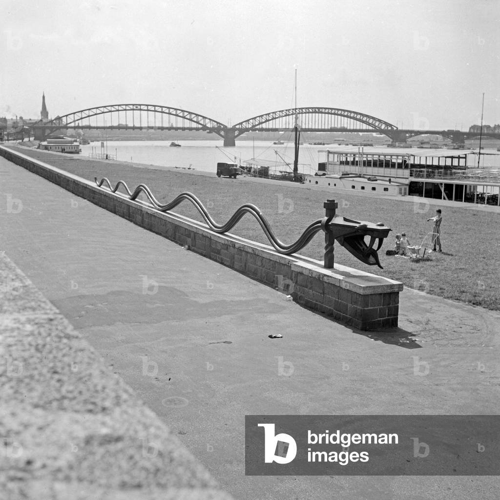 Rhine snake sculpture at the shore of the Rhine at Duesseldorf, Germany 1930s (b/w photo)