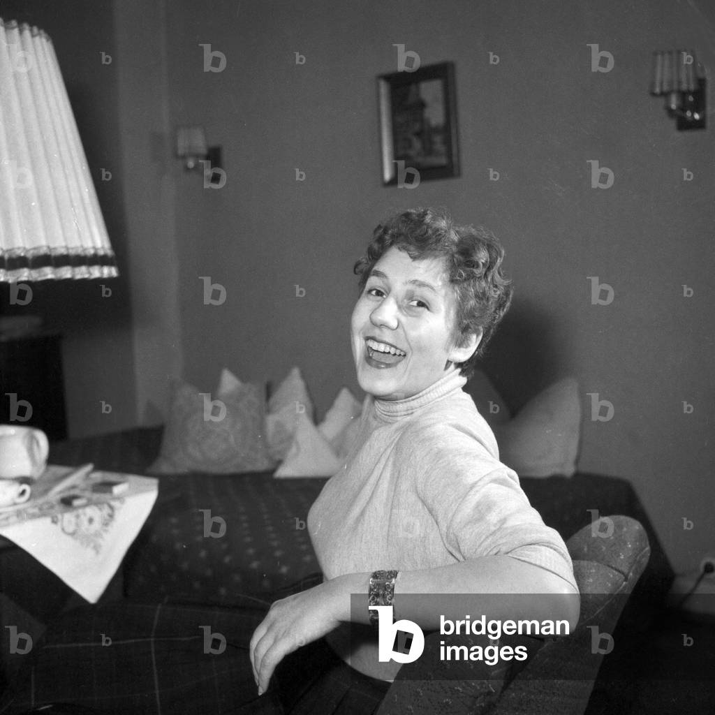 A woman in her living room, Germany 1955