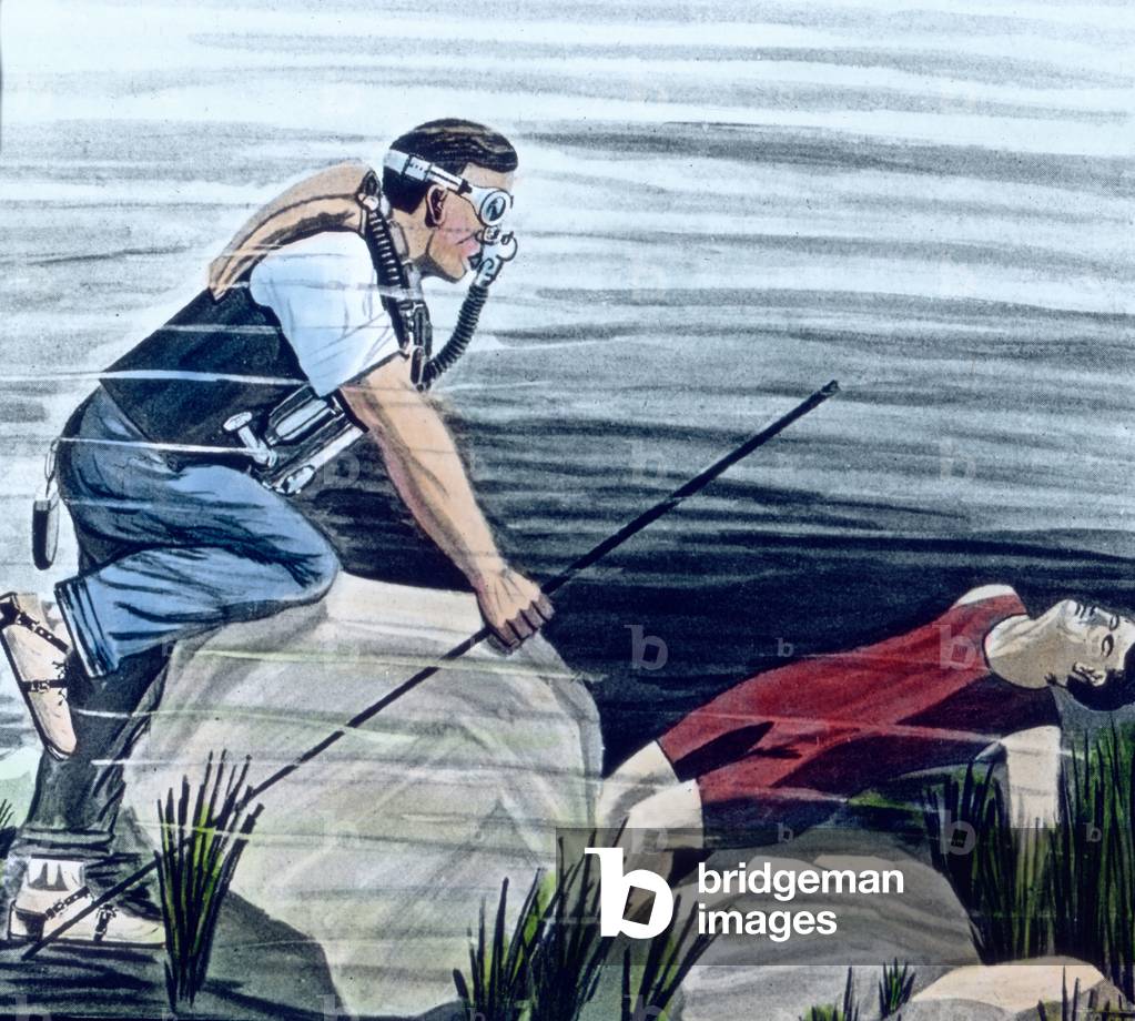 Diver saving a drowning man, 1920s