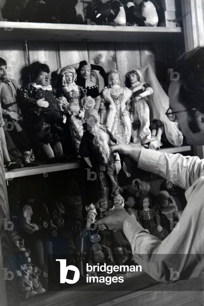 Hermann Diehl, one of the founders and the designer of the popular hedgehog character Meckie in the puppet atelier on the set of the animated children´s movie The Race between the Rabbit and the hedgehog, Germany 1930s (b/w photo)