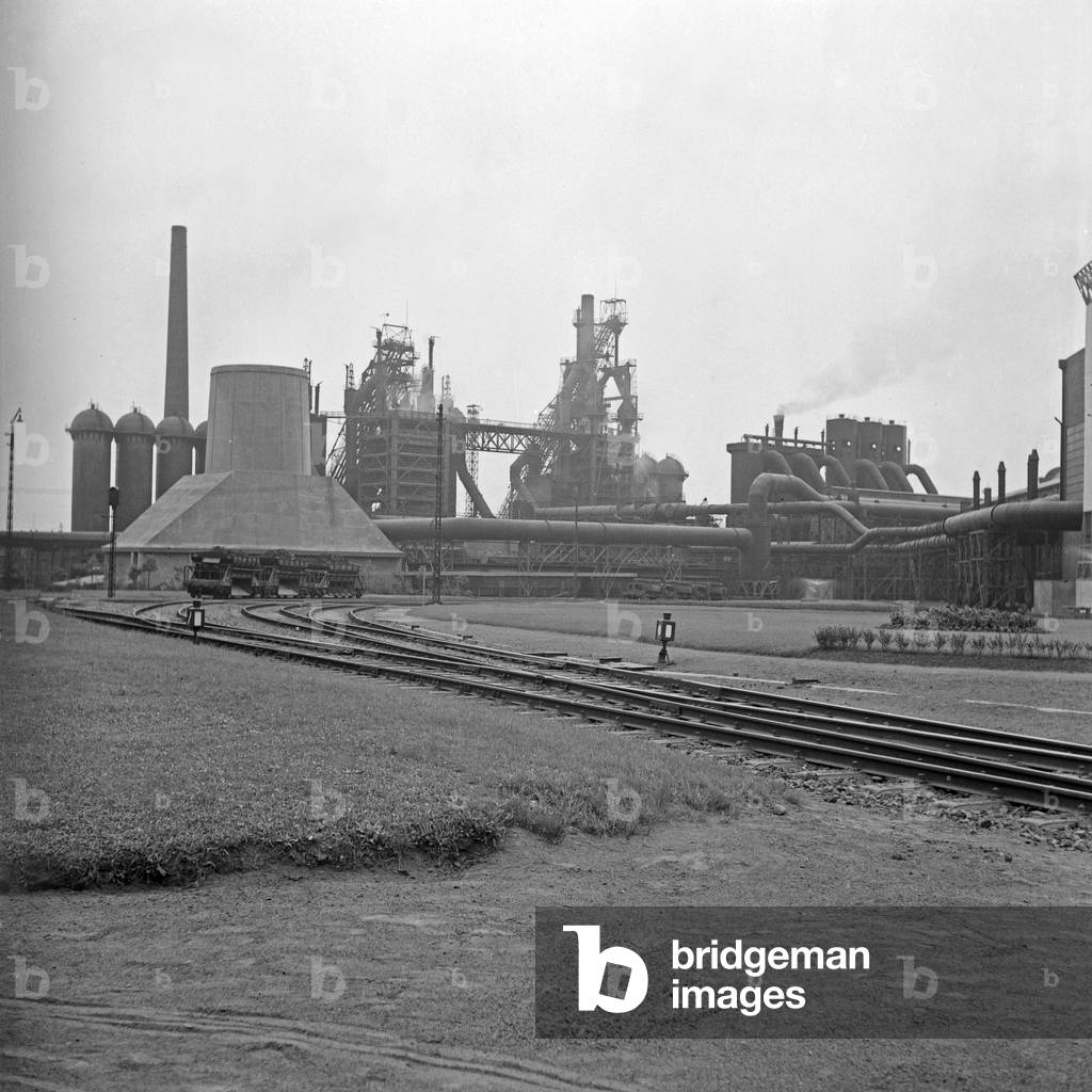Entry line to Gutehoffnungshuette industrial concern at Oberhausen, Germany 1930s (b/w photo)