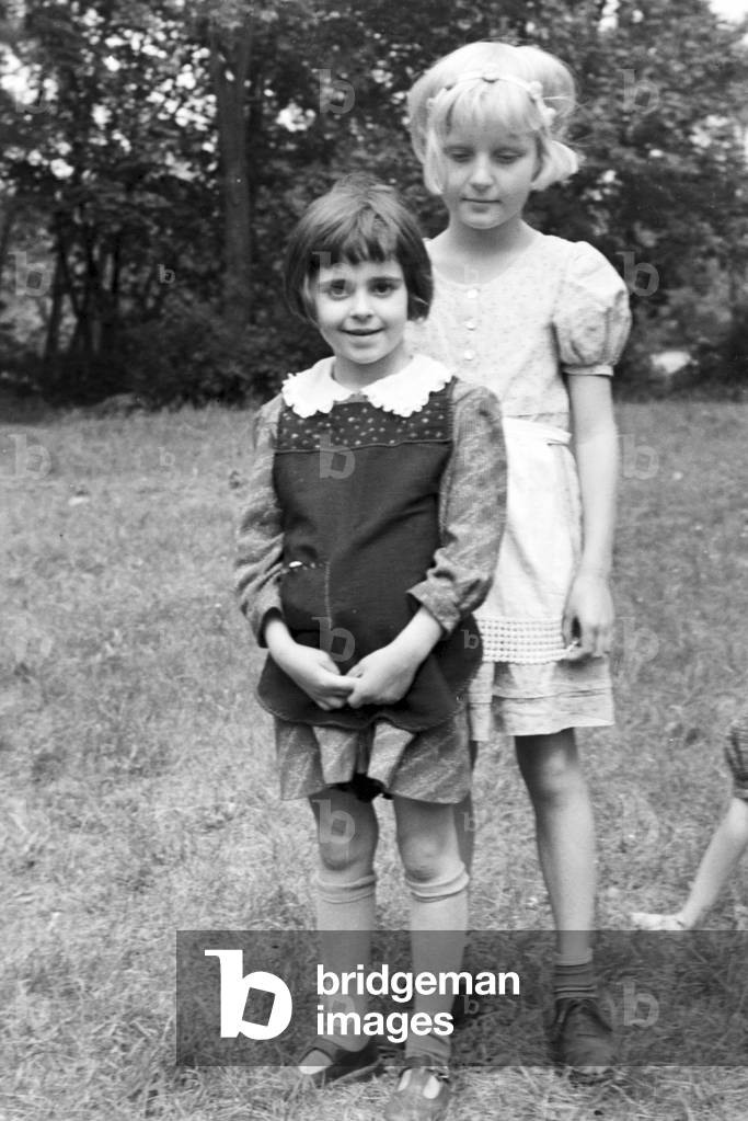 Scenes from childhood in Germany during the 1930s (b/w photo)