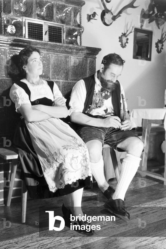 A couple from Bad Tölz wearing a traditional Tracht, Germany 1930s (b/w photo)