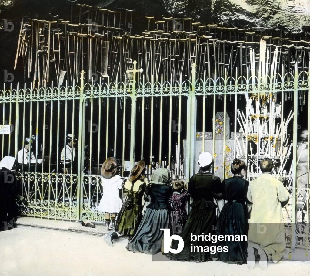 A last prayer in front of the Lourdes grotto