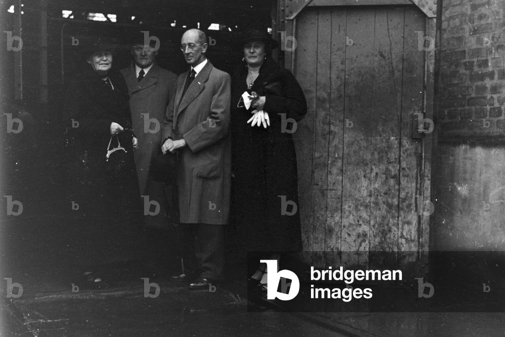 Special guests arriving at the entrance on the Diesel anniversary at the MAN factory at Augsburg, Germany 1930s (b/w photo)