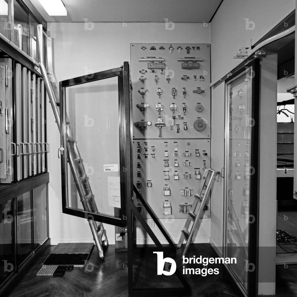 Inside of the outlet of architectural hardware company Musfeldt at Hamburg by night, Germany 1960s