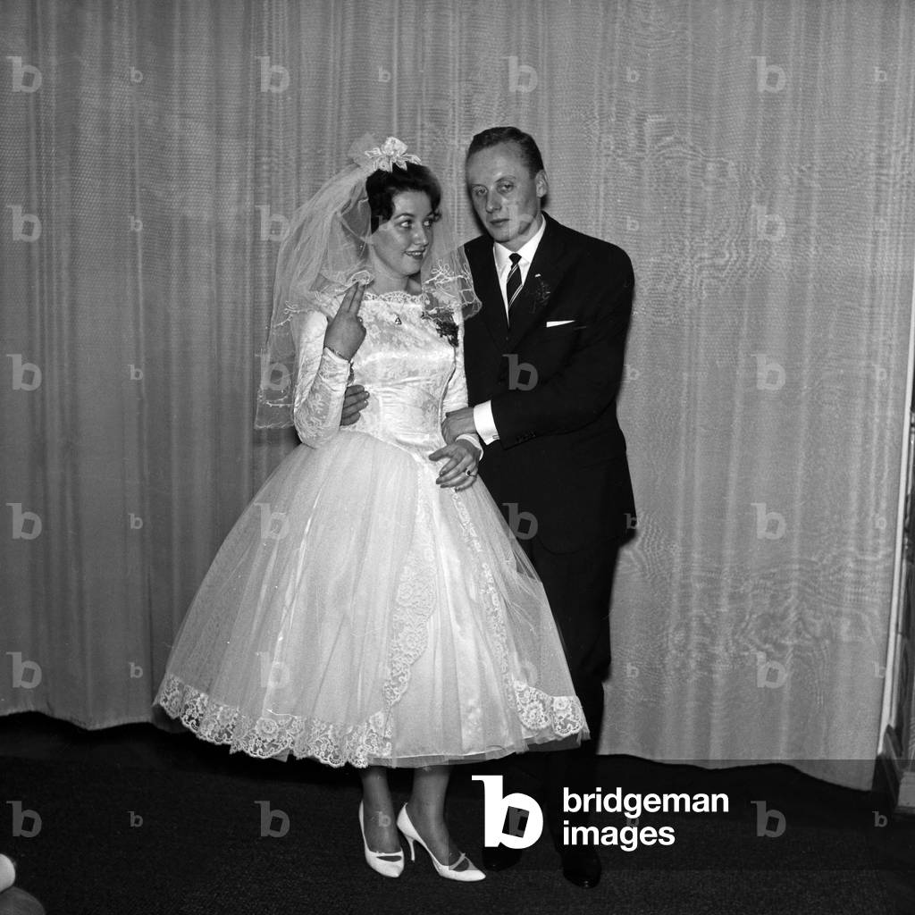 A bridal coiple on its wedding day, Germany 1960s