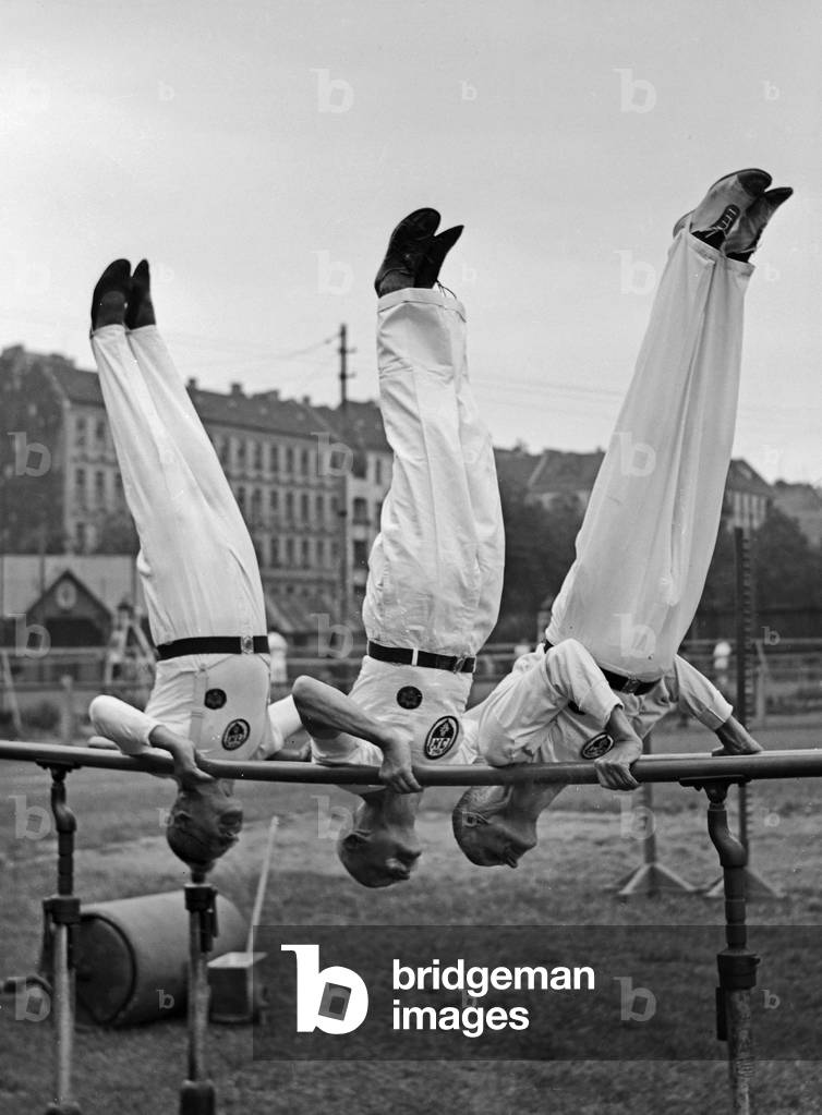 Members of a senior department of a gymnastic club exercising, Germany 1930s (b/w photo)