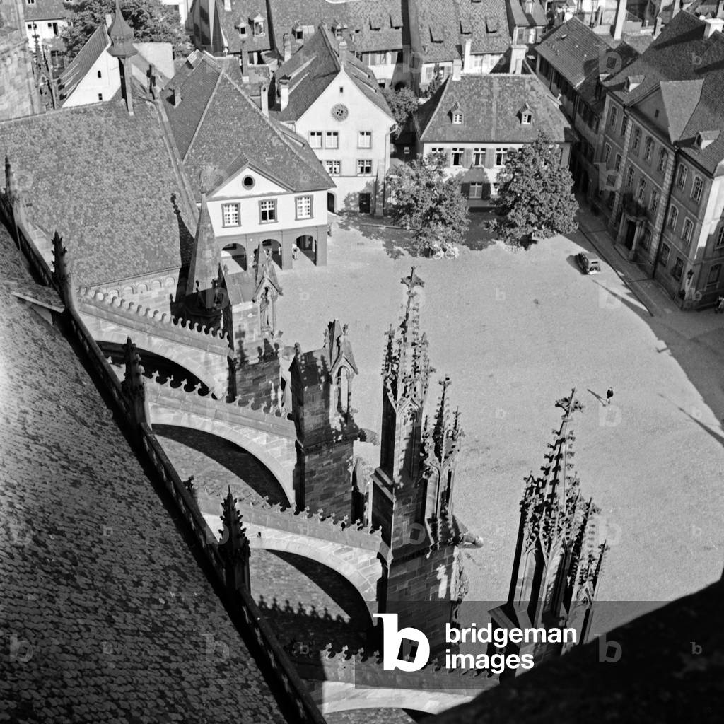View from the belfry of the minster at Freiburg to the roofs of the city, Germany 1930s (b/w photo)
