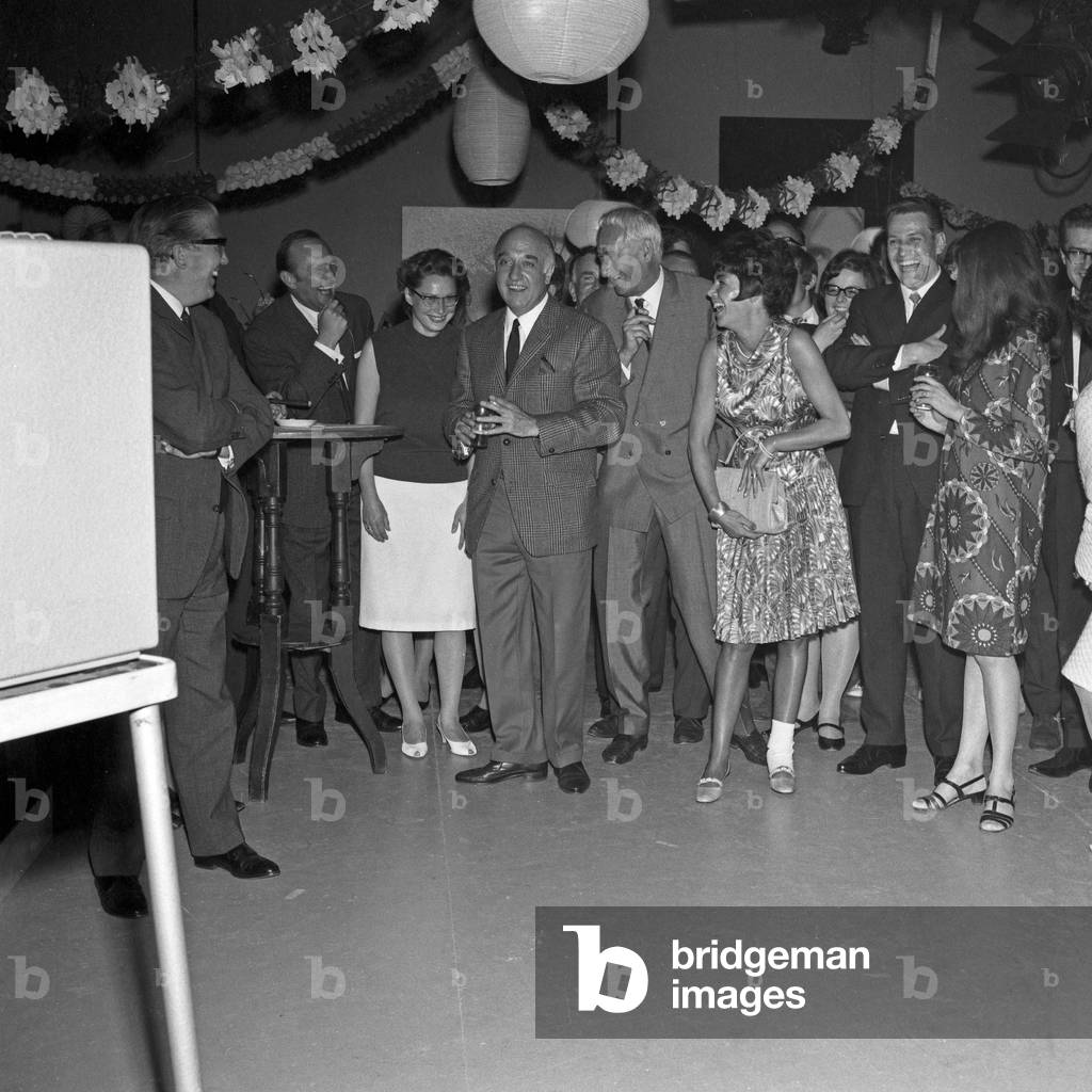 Scientist professor Heinz Haber (center) at a party in TV studio A1, Germany 1960s