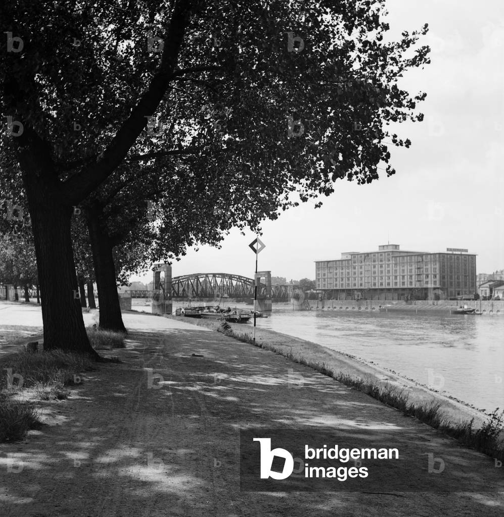 View over river Elbe to a harbor office building at Magdeburg, Germany 1930s (b/w photo)