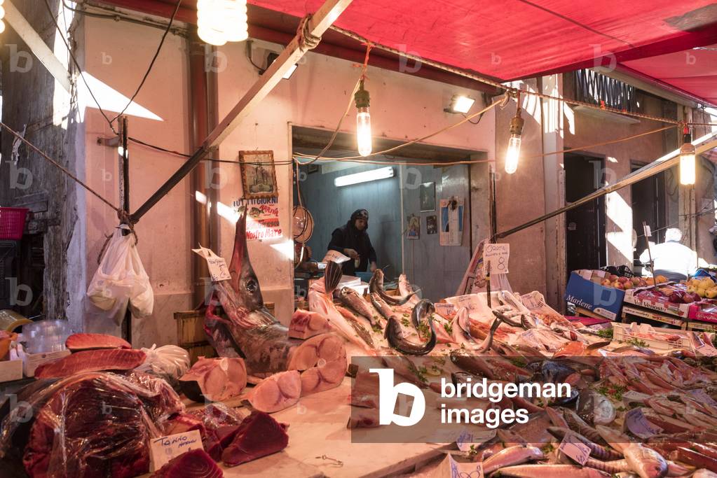 A fishmonger kiosk in the Capo market, Palermo, Sicily, Italy, December 2015 (photo)