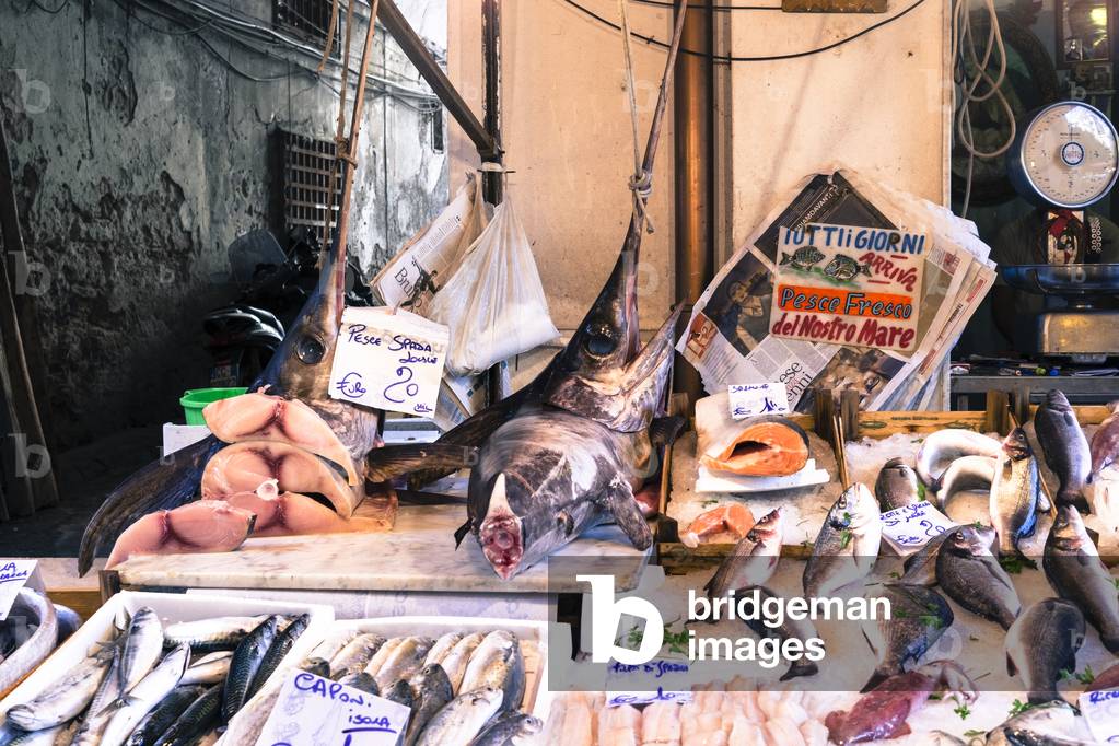 A fishmonger kiosk in the Capo market, Palermo, Sicily, Italy, August 2014 (photo)