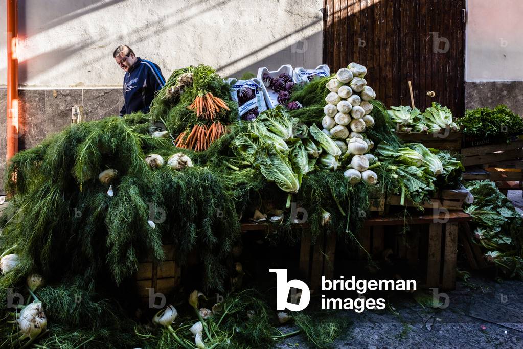 A greengrocer kiosk in the Capo market, Palermo, Sicily, Italy, December 2015 (photo)