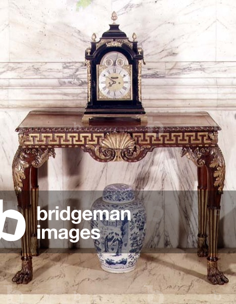Carved and parcel-gilt mahogany side-table, clock by Rimbault; Delft jar, c.1700