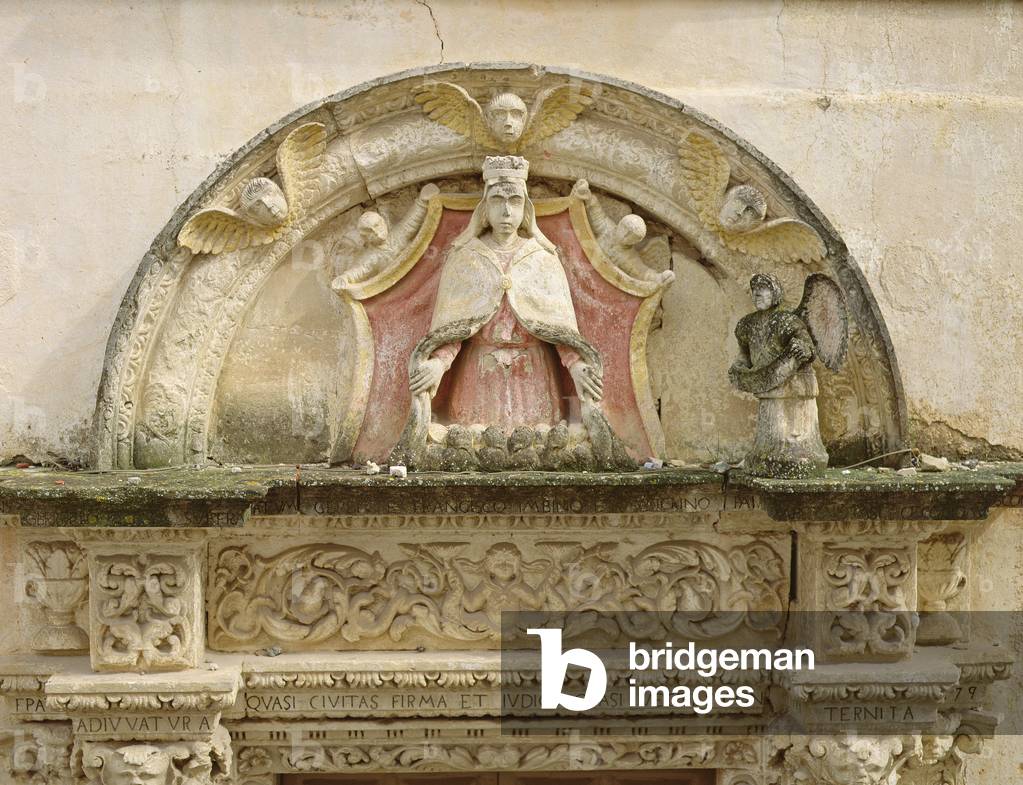 Madonna of the Misericordia, detail of the portal lunette (stone)