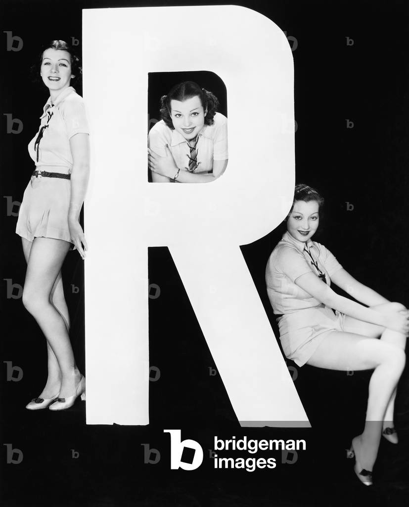 Three Women Posing with Huge Letter R
