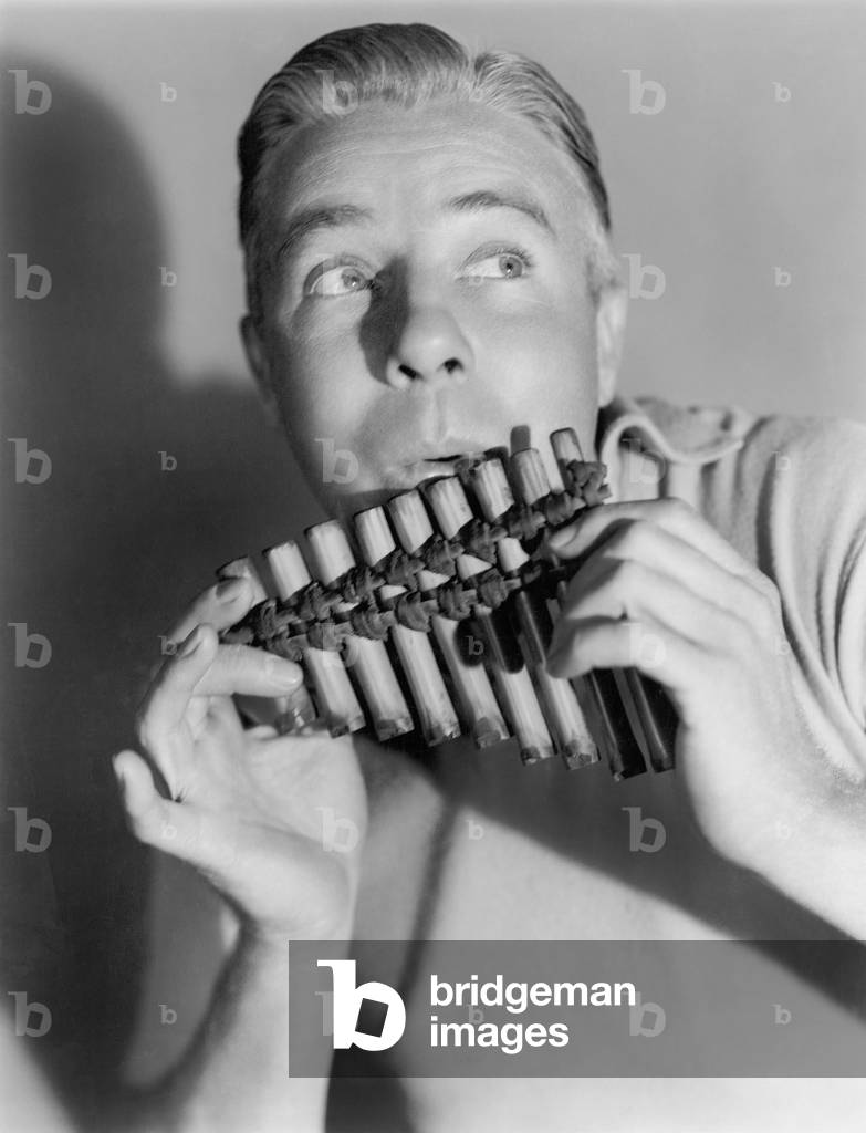 Man Playing a Pan Flute