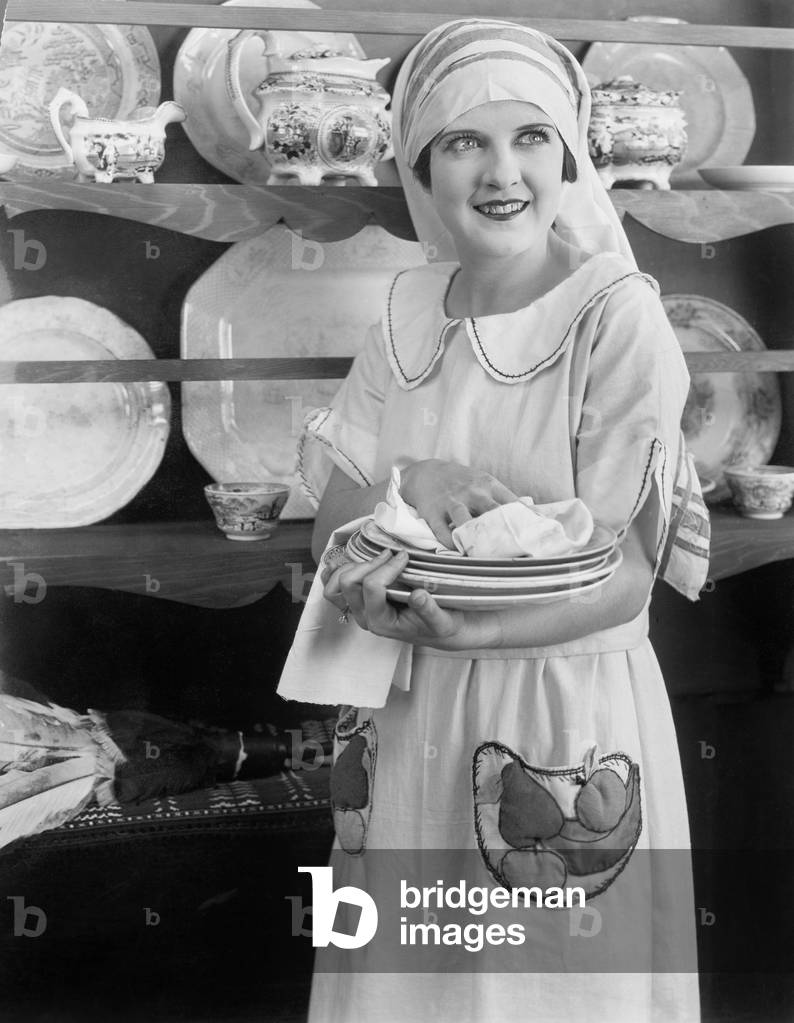 Housekeeper Drying Plates