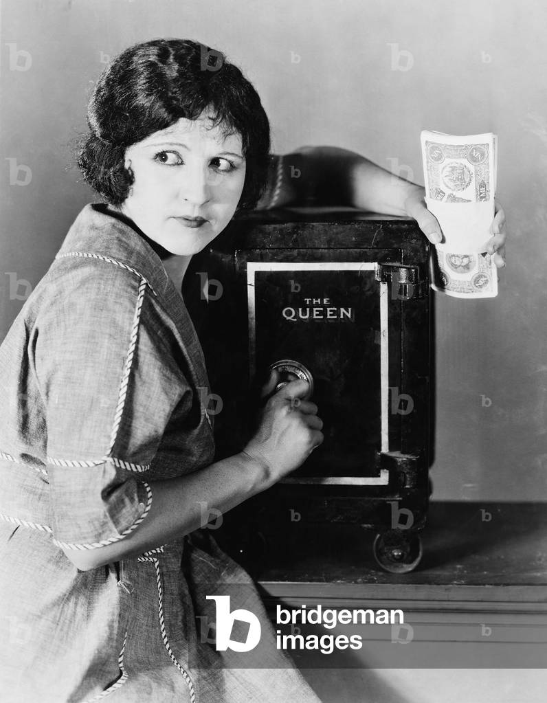 Woman with Money and Safe