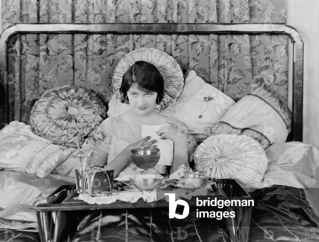 Woman Having Breakfast in Bed
