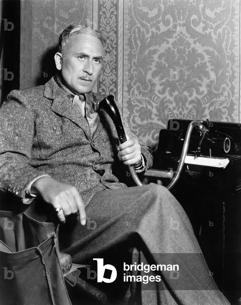 Man Talking on an Old Fashioned Telephone