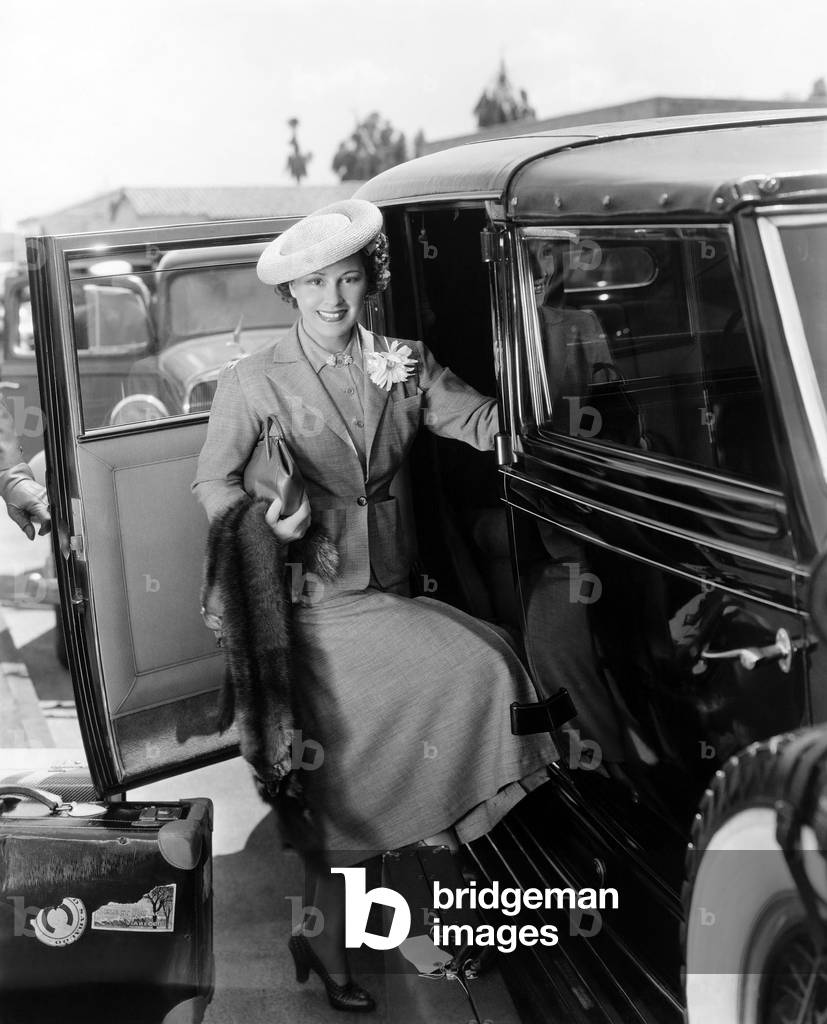 Woman with Car and Luggage