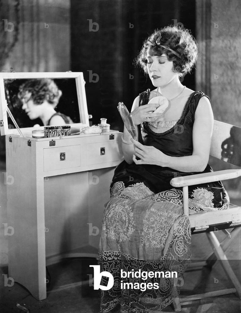 Woman at Dressing Table