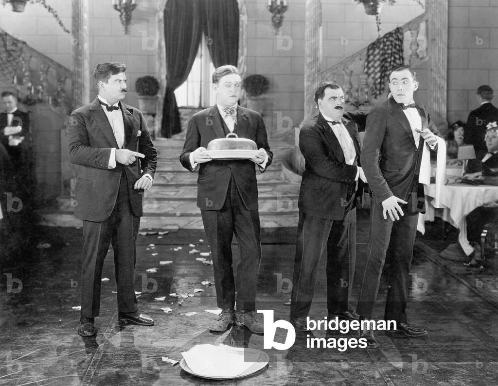Restaurant with Two Managers and Two Waiters and Broken Plates