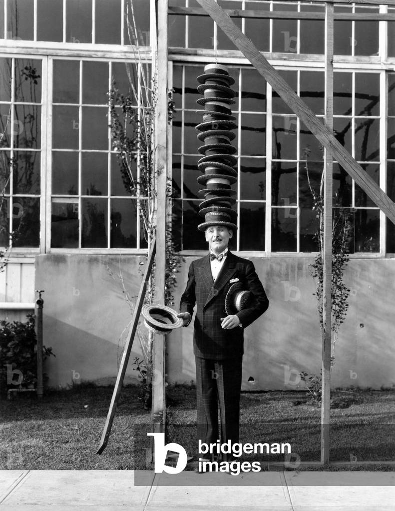 l hommeet les chapeaux