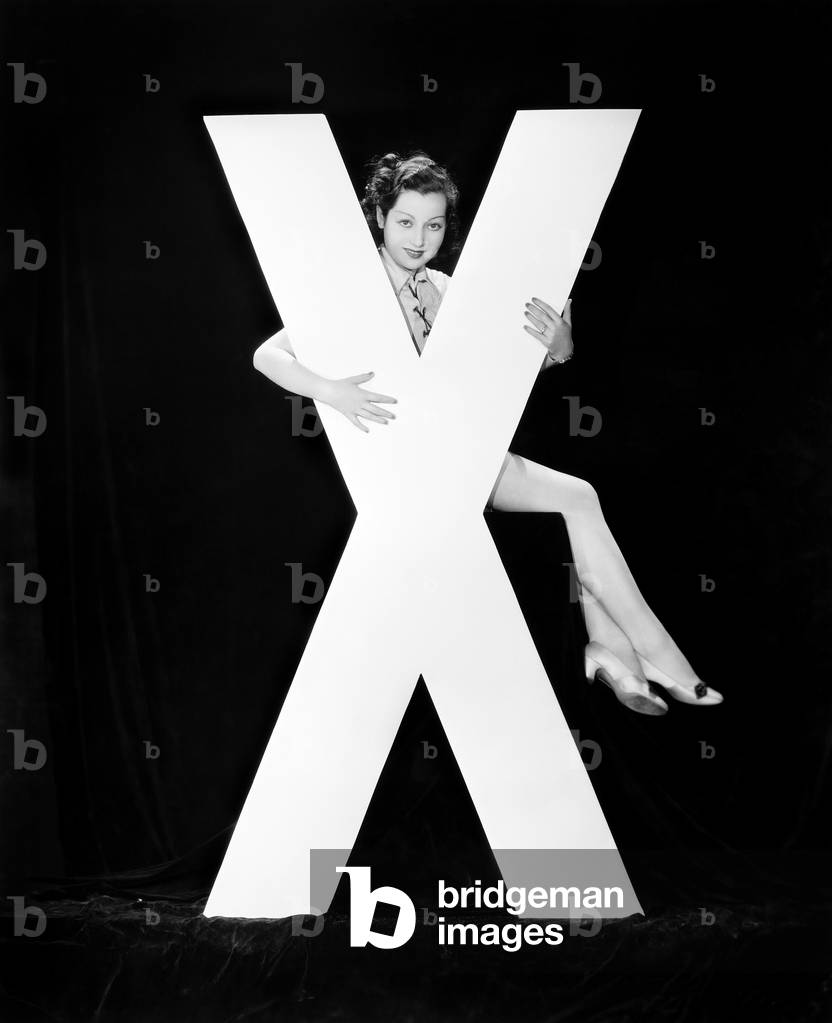 Woman with Huge Letter X