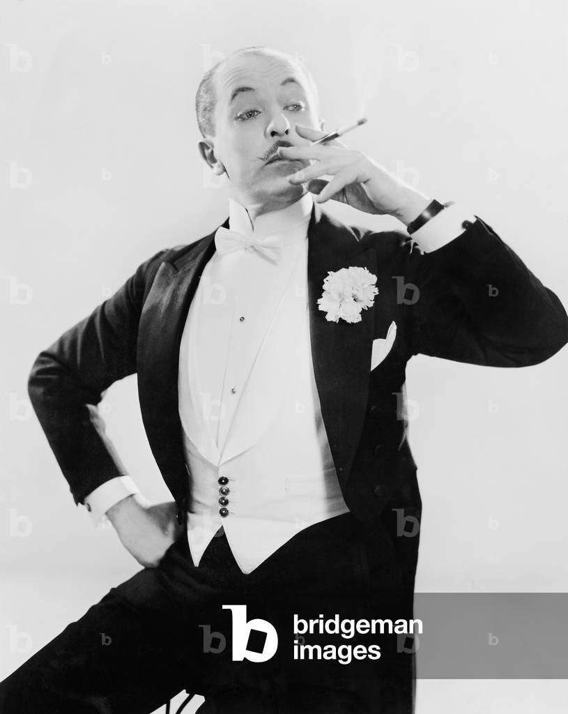 Man in White Tie Posing with a Cigarette