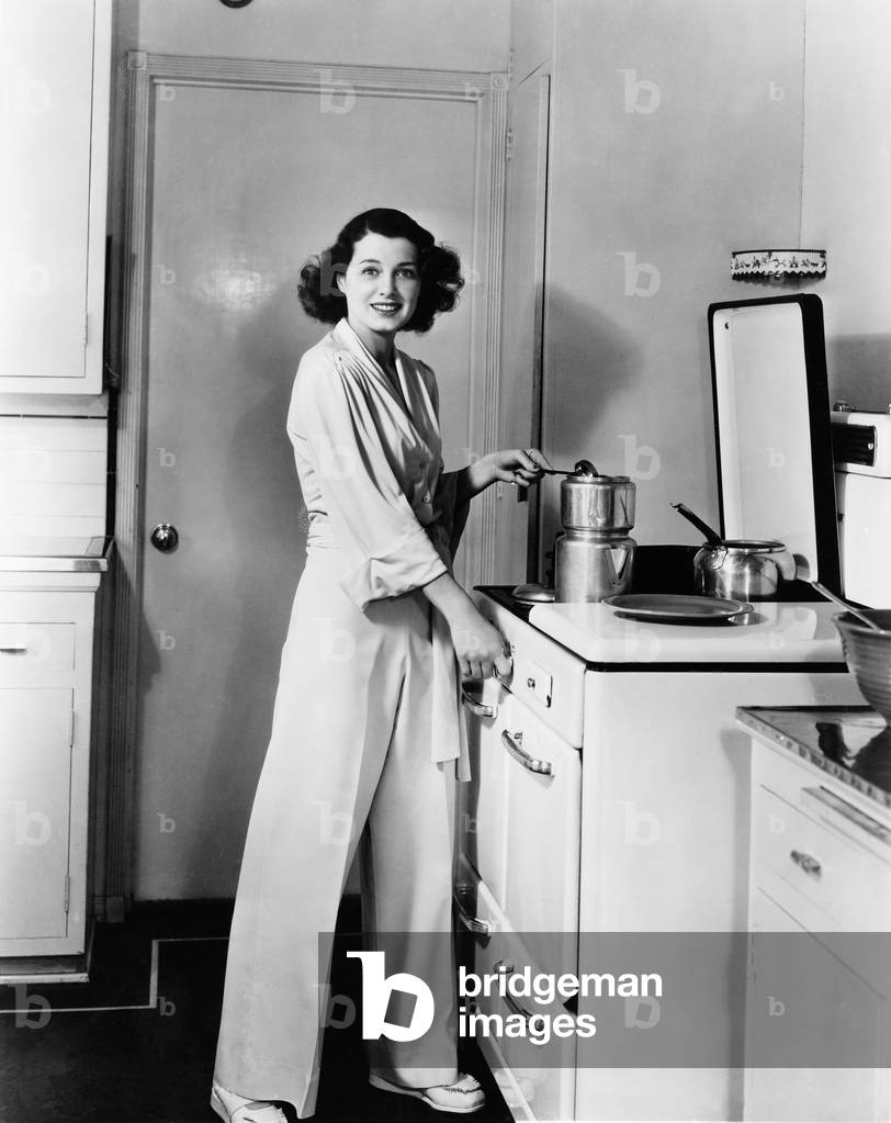 Portrait of Woman at Stove in Kitchen