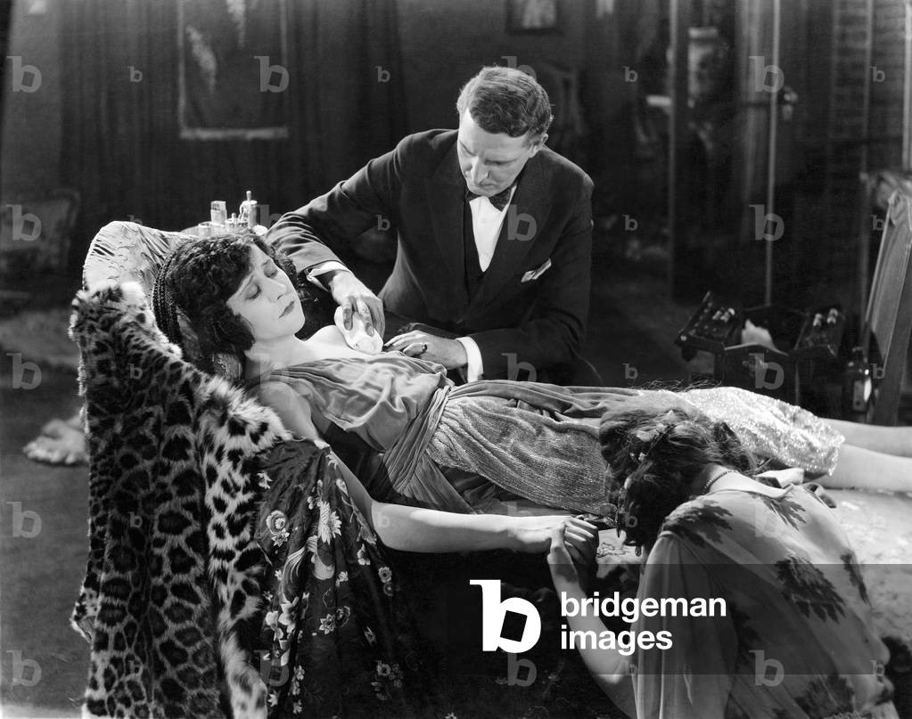 Man Tending to Injured Woman