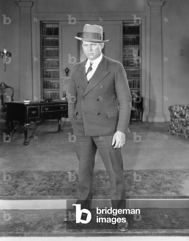 Man Standing in an Office