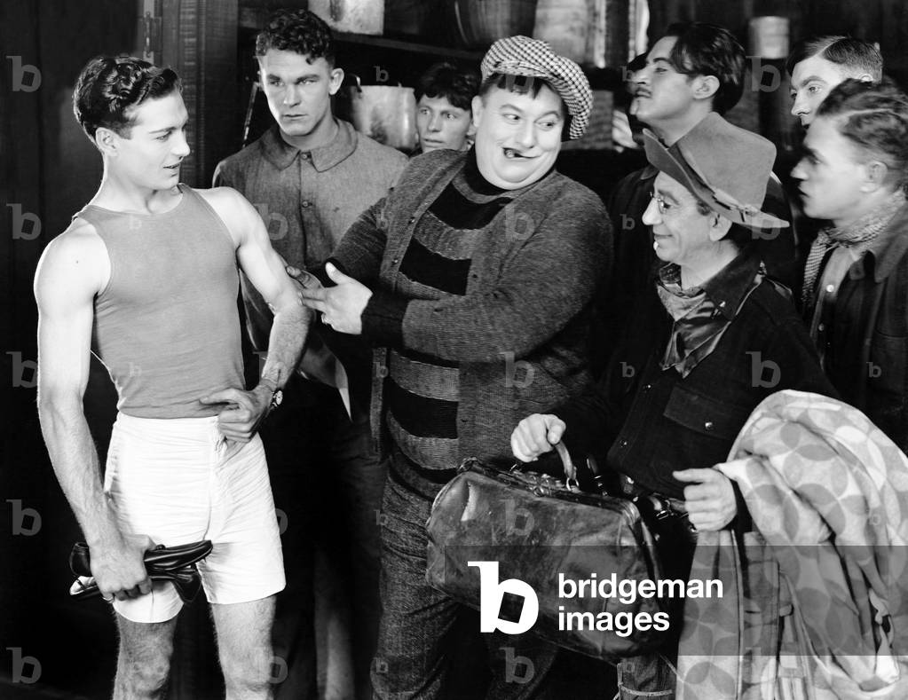 Group of Men Looking at an Athlete
