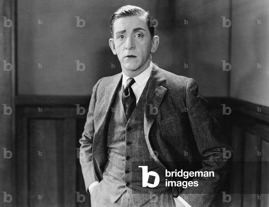 Portrait of a Businessman Standing with his Hands in his Pockets