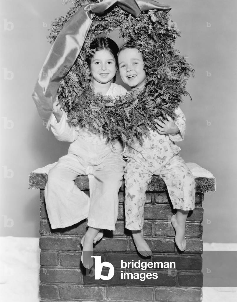 Brother and Sister Sitting on a Chimney