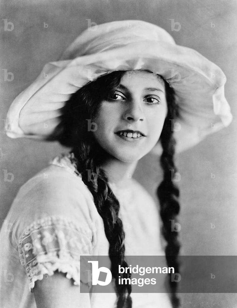 Portrait of Young Woman with Braids