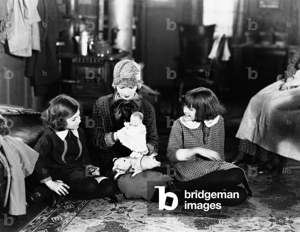 Girls and Mother on Floor with Doll