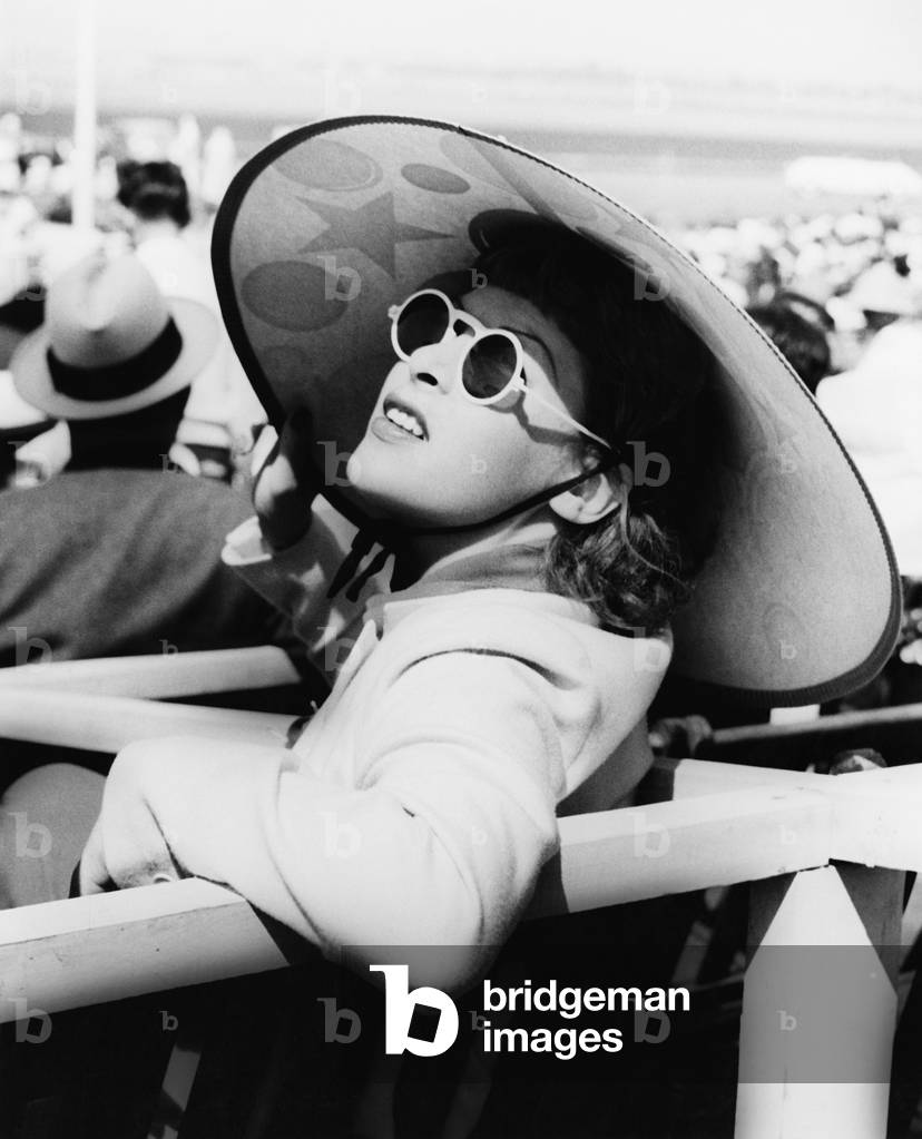 Woman in a Big Sun Hat and Sun Glasses