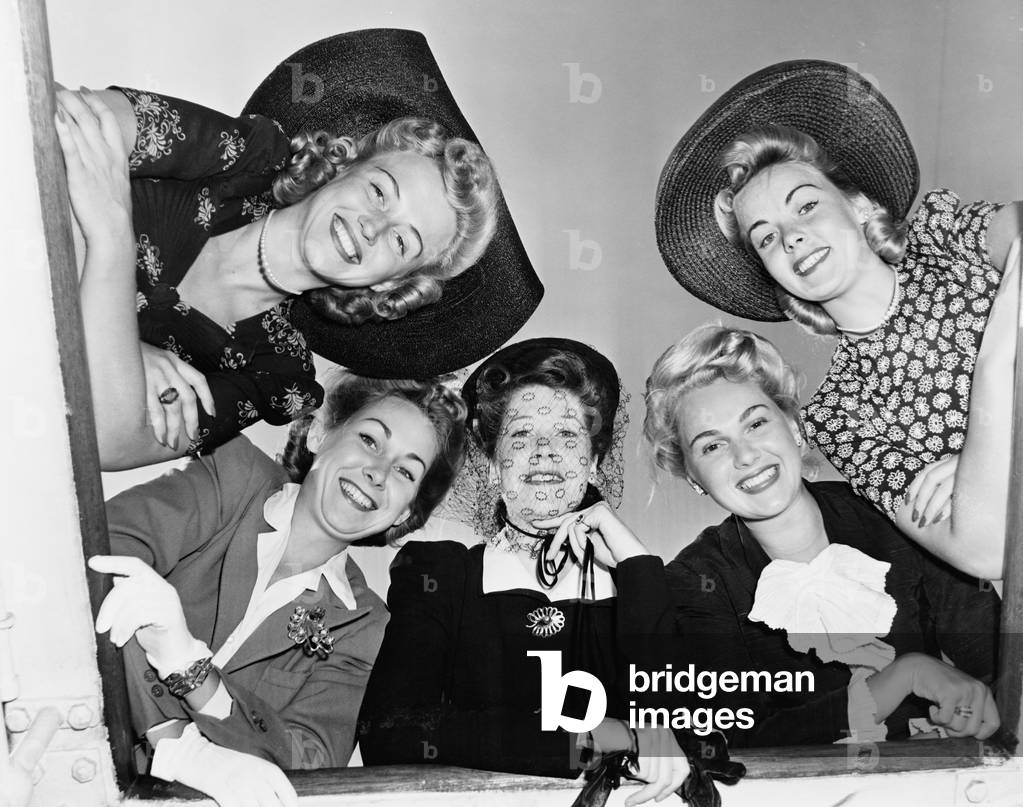 Portrait of Five Young Women Smiling and Looking Down