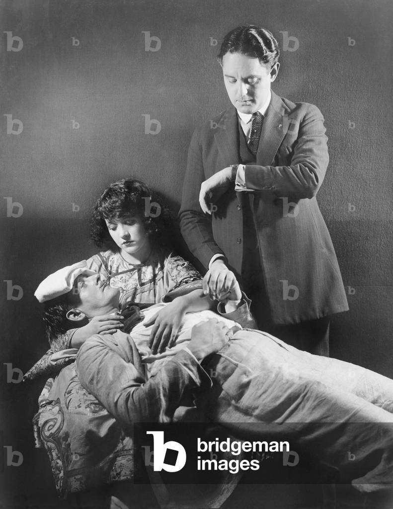 Doctor Taking the Pulse of a Sick Man