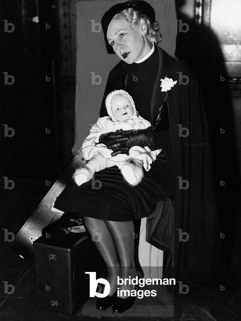 Sad Woman with Baby Doll