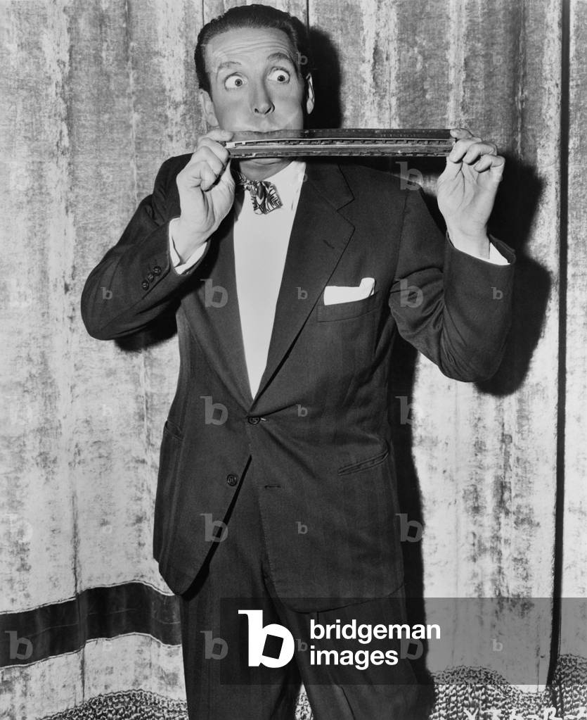 Portrait of Man Playing Huge Harmonica