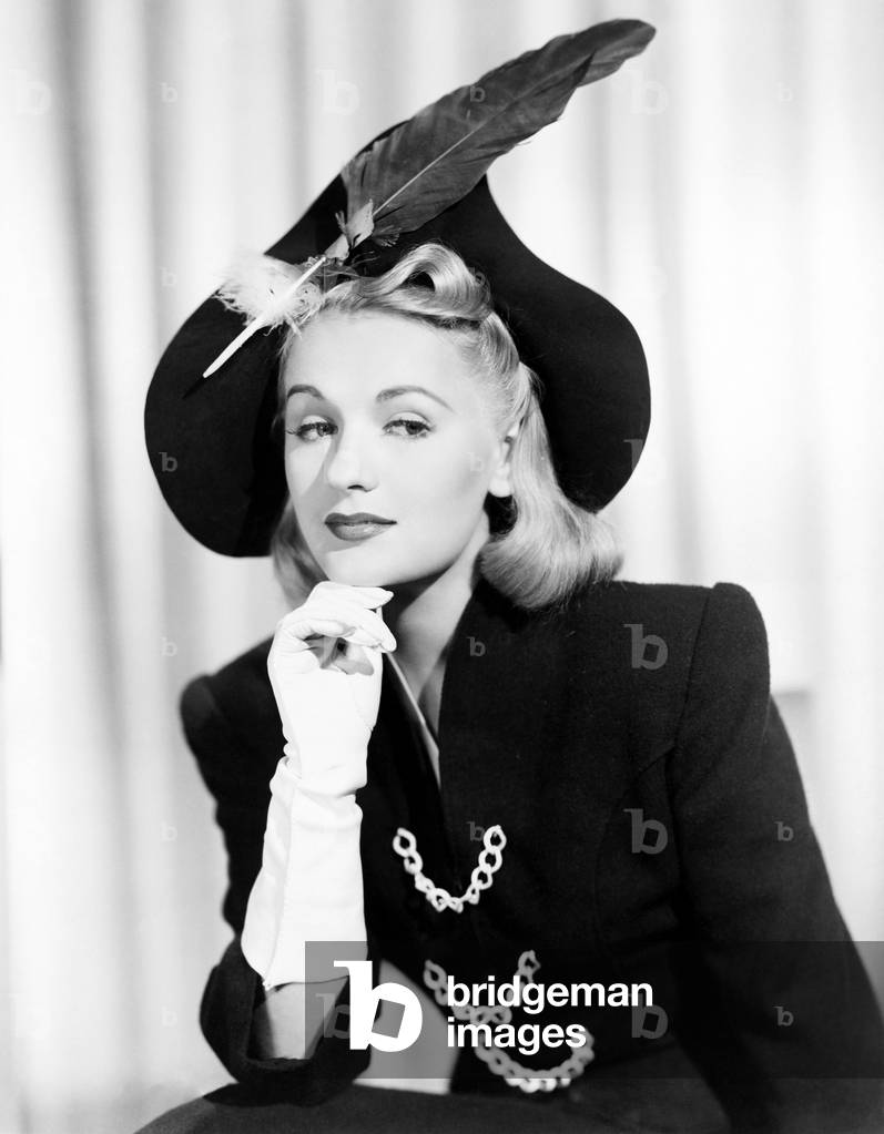 Portrait of Woman Wearing Hat with Feather