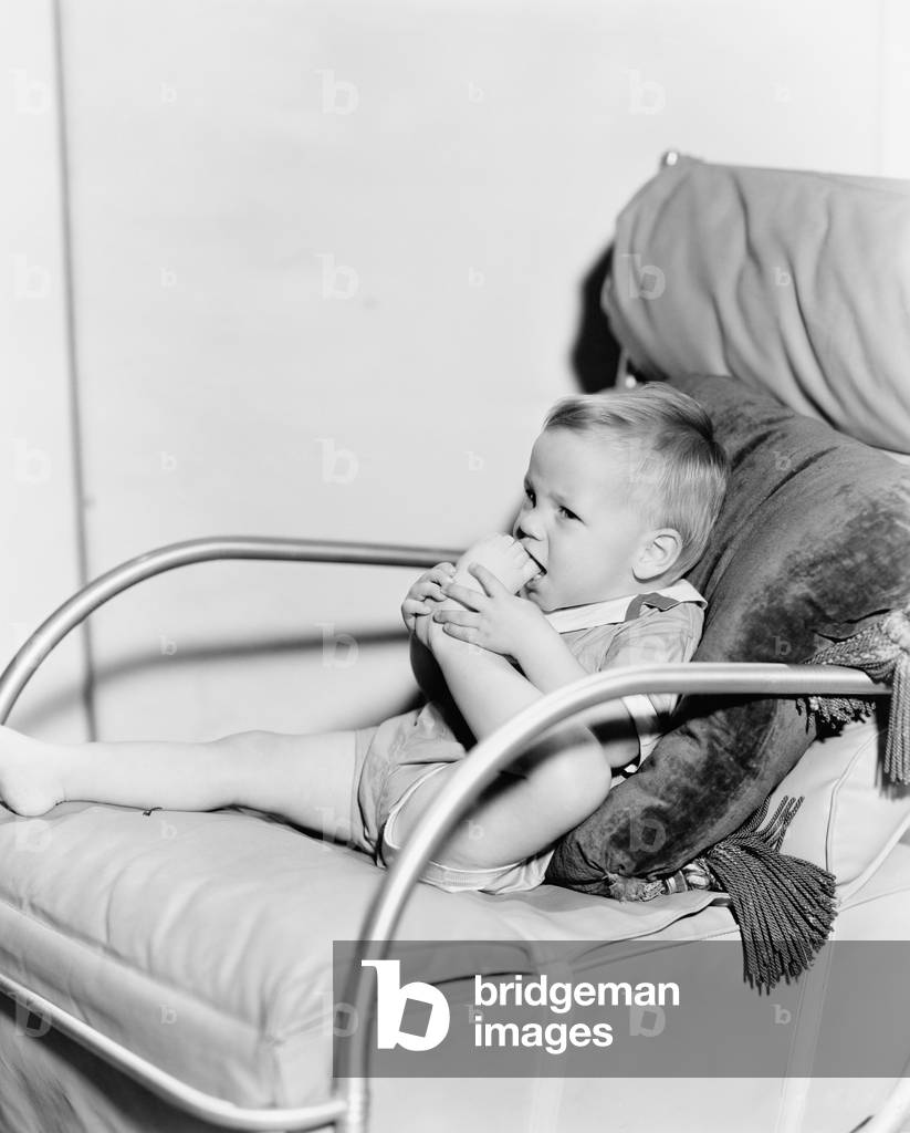 Kid Chewing on Toes
